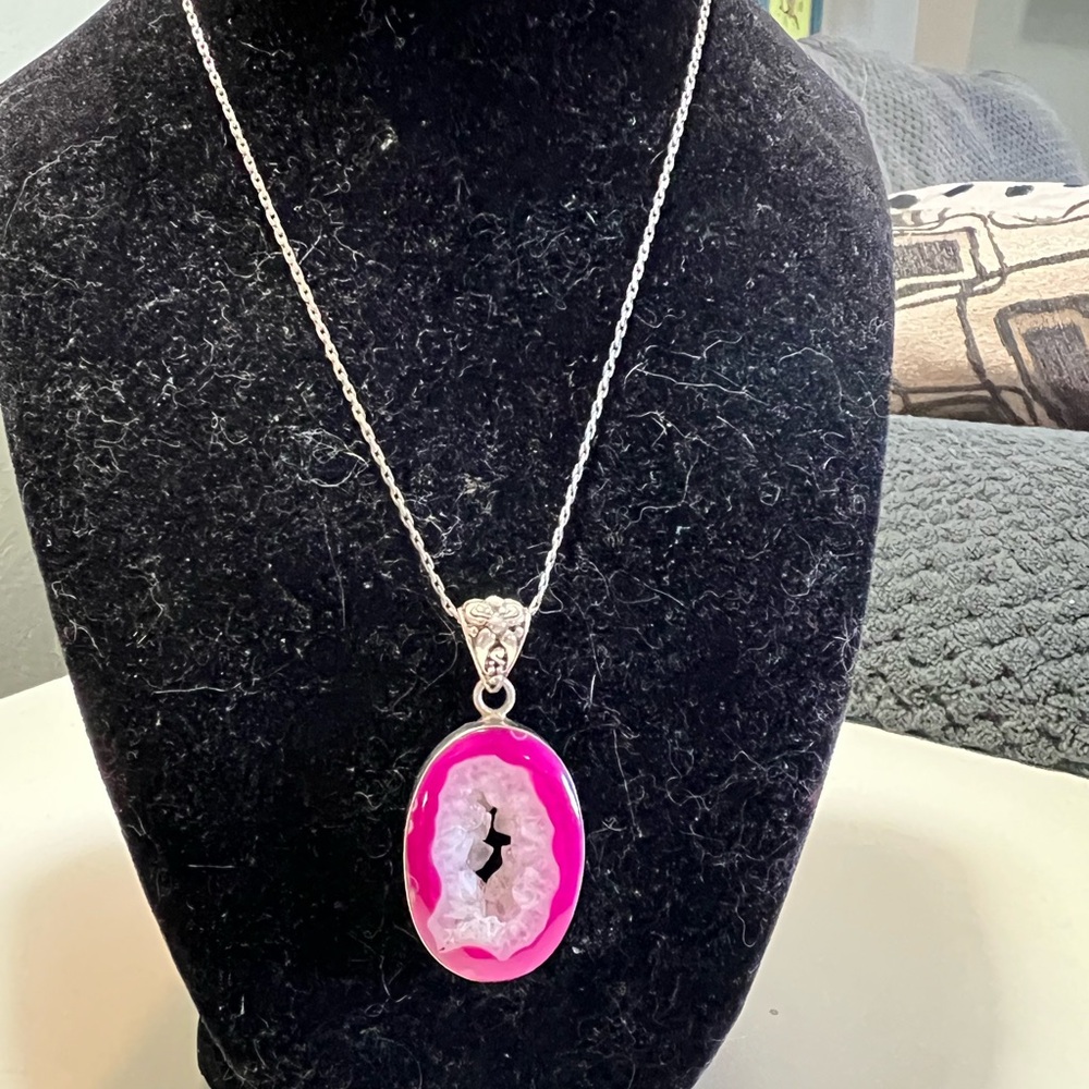 Pink agate slice geode pendant on a sterling silver chain. Pendant also sterling